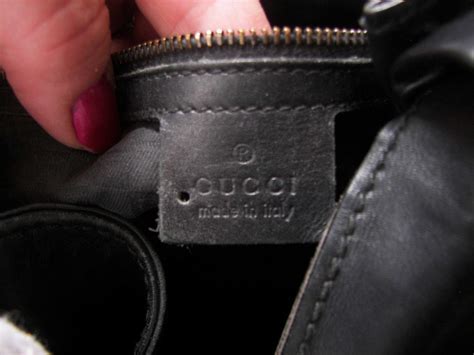 what does a hole punch in my gucci bag mean|gucci bag counterfeit.